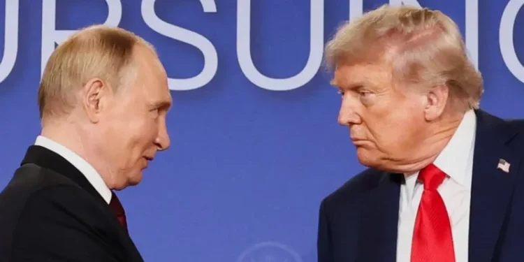 L-R Russia President Vladimir Putin and US President Donald Trump