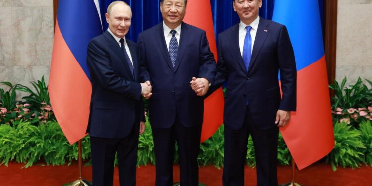 Chinese President Xi Jinping, Russian President Vladimir Putin and Mongolian President Ukhnaa Khurelsukh hold a trilateral meeting at the Great Hall of the People in Beijing, capital of China, Sept. 2, 2025. (Xinhua/Ding Haitao)