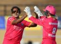 Chamari Athapaththu, left, and Georgia Redmayne of Barbados Royals celebrate the wicket of Jannillea Glasgow of Trinbago Knight Riders during the Women's 2025 Massy Caribbean Premier League match at Providence Stadium in Guyana, on September 10. (Photo by Ashley Allen - CPL T20/CPL T20 via Getty Images) -