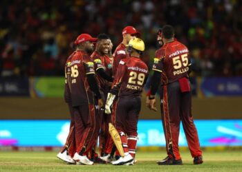 Akeal Hosein (C) of Trinbago Knight Riders celebrates with teammates after getting the wicket of Keemo Paul of Guyana Amazon Warriors during the 2025 Republic Bank Caribbean Premier League match at Providence Stadium on September 6, in Georgetown, Guyana. - (CPL T20)
