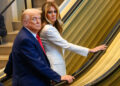 The president and first lady wait on a stalled escalator at the United Nations on Tuesday.Alexi J. Rosenfeld / Getty Images