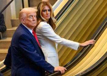 The president and first lady wait on a stalled escalator at the United Nations on Tuesday.Alexi J. Rosenfeld / Getty Images