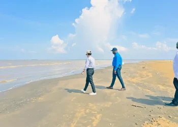 No. 63 Beach Corentyne, Berbice Minister  Susan Rodriques and team walk across