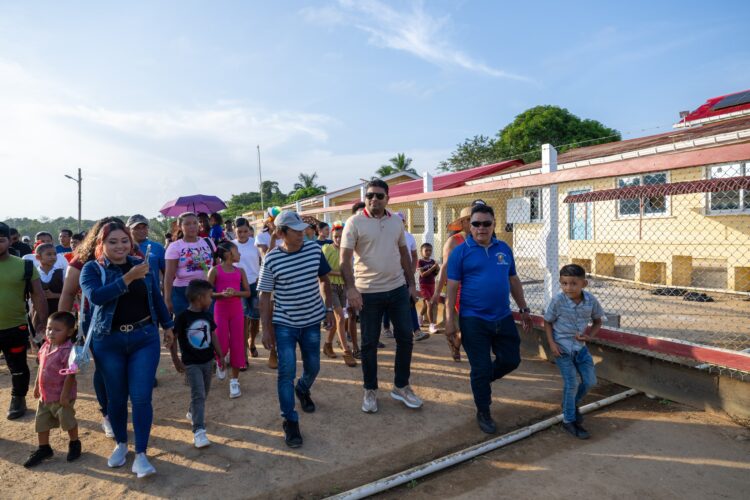 Incoming Opposition Leader Azruddin Mohamed ( in khaki polo) visiting with the Indigenous community (Team Mohamed's Facebook photo)