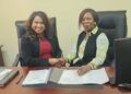 (L-R) Dr. Lisa Indar, Executive Director, CARPHA and Professor Paulette Bynoe, Chair, GWP-C, following the signing of the MOU by both entities.