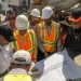 Minister of Public Works, Bishop Juan Edghill, Minister of Housing, Collin Croal and a technical team examine the layout for the connector road