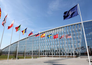 National flags of Alliance's members flutter at NATO headquarters in Brussels, Belgium April 2, 2025. REUTERS/Yves Herman/ File Photo