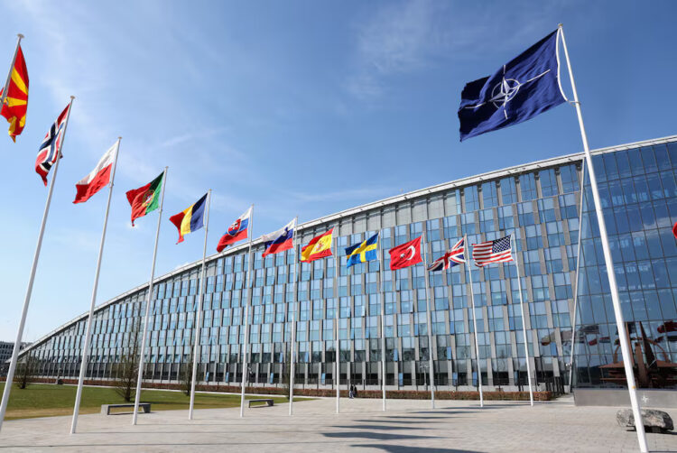 National flags of Alliance's members flutter at NATO headquarters in Brussels, Belgium April 2, 2025. REUTERS/Yves Herman/ File Photo