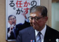 Japan's Prime Minister and President of the ruling Liberal Democratic Party (LDP) Shigeru Ishiba looks on after meeting with the party's executives at the LDP headquarters in Tokyo, Japan, July 23, 2025. REUTERS/Kim Kyung-Hoon/File photo Purchase Licensing Rights