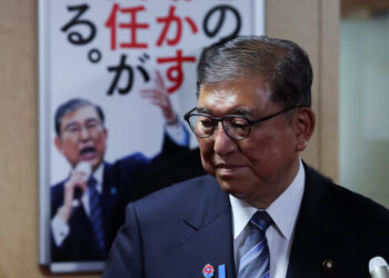 Japan's Prime Minister and President of the ruling Liberal Democratic Party (LDP) Shigeru Ishiba looks on after meeting with the party's executives at the LDP headquarters in Tokyo, Japan, July 23, 2025. REUTERS/Kim Kyung-Hoon/File photo Purchase Licensing Rights