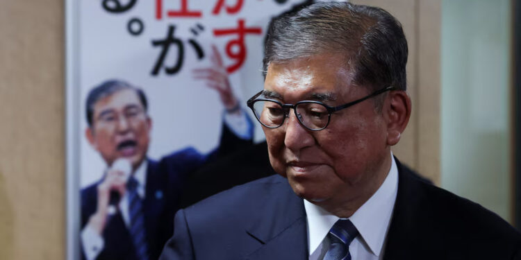 Japan's Prime Minister and President of the ruling Liberal Democratic Party (LDP) Shigeru Ishiba looks on after meeting with the party's executives at the LDP headquarters in Tokyo, Japan, July 23, 2025. REUTERS/Kim Kyung-Hoon/File photo Purchase Licensing Rights