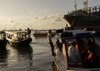 Boats dock at Stabroek Market in Georgetown, Guyana, on Sunday. Matias Delacroix/AP