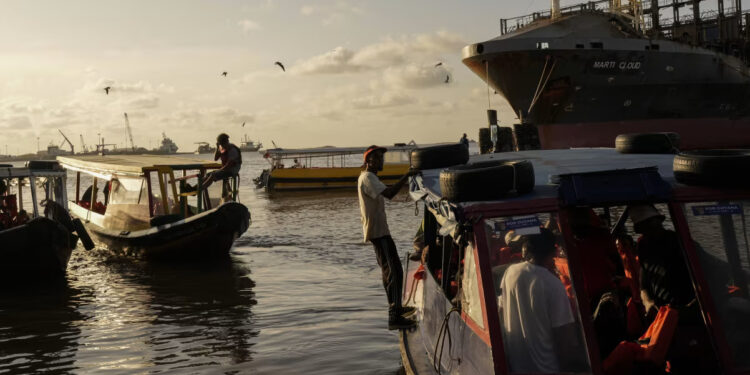Boats dock at Stabroek Market in Georgetown, Guyana, on Sunday. Matias Delacroix/AP