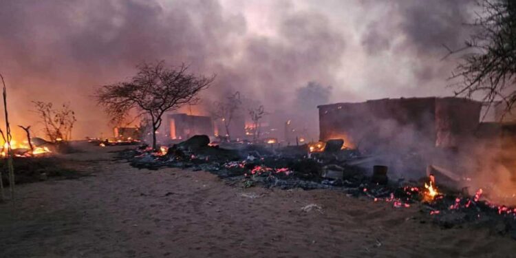 Destruction in the Abu Shouk refugee camp in northern Darfur. Photograph: Darfur Network for Human Rights