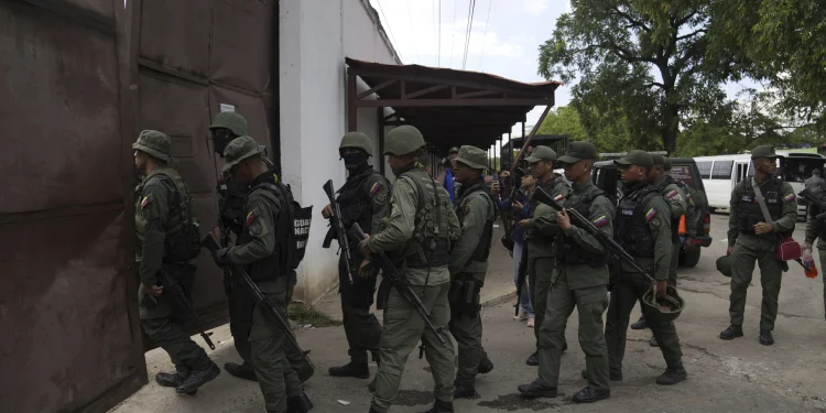 Soldiers raid the Tocoron Penitentiary Center where the Tren de Aragua gang originated, in Tocoron, Venezuela, Sept 20,2023, AP Photo/ Ariana Cubillos, File