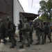 Soldiers raid the Tocoron Penitentiary Center where the Tren de Aragua gang originated, in Tocoron, Venezuela, Sept 20,2023, AP Photo/ Ariana Cubillos, File
