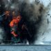 Fishing boat being blown up in indonesia