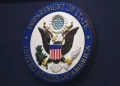 The State Department seal is seen on the briefing room lectern ahead of a briefing by State Department spokesperson Ned Price at the State Department in Washington, January 31, 2022. Mandel Ngan/AP