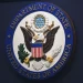 The State Department seal is seen on the briefing room lectern ahead of a briefing by State Department spokesperson Ned Price at the State Department in Washington, January 31, 2022. Mandel Ngan/AP