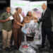 Caribbean Airlines’ CEO Garvin Medera (right) hands over stationery supplies along  with gift vouchers donated by Charran’s Bookstore to representatives of the St. Jude’s  Home for Girls at the airline’s Piarco Head Office.