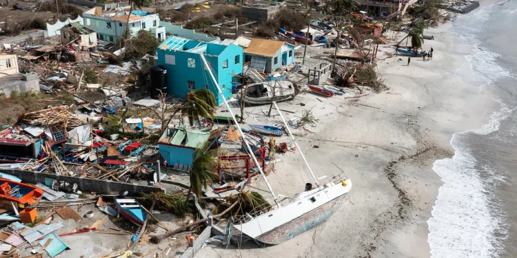 Damaged and destroyed homes and boats in Petite Martinique, Grenada, after Beryl passed the Caribbean island. Photo Credit - Arthur Daniel