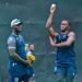 (FILE) West Indies’ pacer Shamar Joseph bowls as head coach Daren Sammy looks on during a practice session on the eve of their second one-day international against Sri Lanka at the Pallekele International Cricket Stadium in Kandy on October 22, 2024. - FILE PHOTO