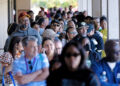 People line up at a food bank for furloughed federal workers Wednesday in Hyattsville, Md.Brendan Smialowski / AFP via Getty Images