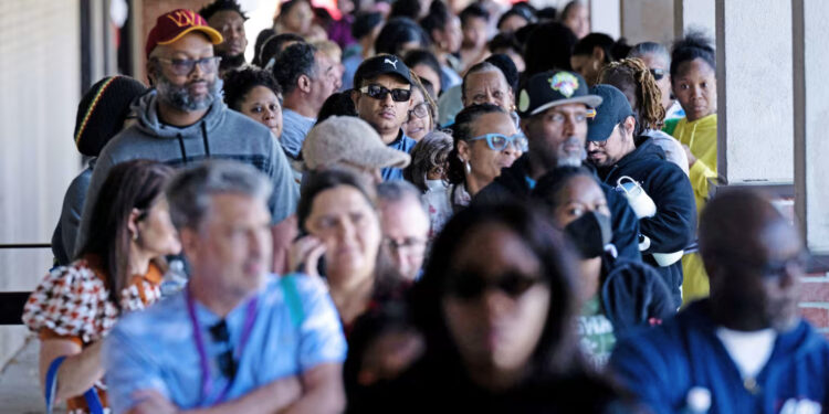 People line up at a food bank for furloughed federal workers Wednesday in Hyattsville, Md.Brendan Smialowski / AFP via Getty Images
