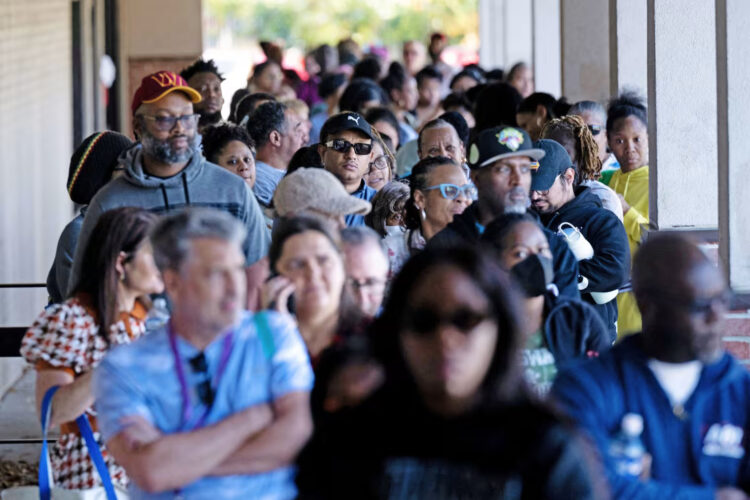 People line up at a food bank for furloughed federal workers Wednesday in Hyattsville, Md.Brendan Smialowski / AFP via Getty Images
