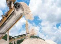 Crushed limestone moves along a conveyor belt at a local quarry. Jamaica is looking to boost exports of construction materials such as limestone and aggregates to meet growing regional demand.