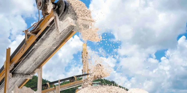 Crushed limestone moves along a conveyor belt at a local quarry. Jamaica is looking to boost exports of construction materials such as limestone and aggregates to meet growing regional demand.