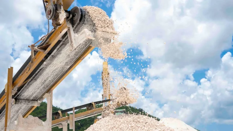 Crushed limestone moves along a conveyor belt at a local quarry. Jamaica is looking to boost exports of construction materials such as limestone and aggregates to meet growing regional demand.
