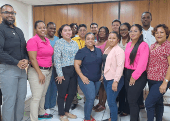 Biorisk Manager Mr. Carlos Rampersad (left) alongside CARPHA IATA Trainer and Participants following the Shipping of Infectious Substances Training in Belize.