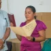 Region Eight Regional Chairperson Tarcellia John  (taking the oath) and Vice Chairperson Samantha John (sitting)