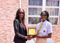 Sian Jeune receiving her plaque