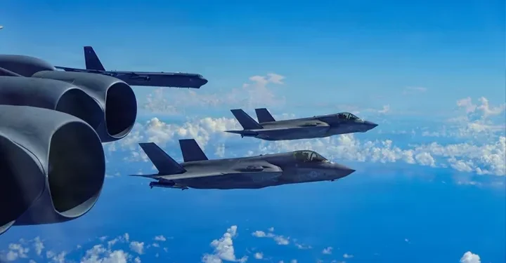 A U.S. Air Force B-52H Stratofortress bomber assigned to the 2nd Bomb Wing, integrates with a U.S. Marine Corps F-35B Lightning II aircraft assigned to the Marine Fighter Attack Squadron 225, in the U.S. Southern Command area.  (U.S. Air Force)