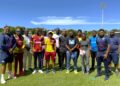 Course Instructors Mr. Brendon Ramlal (left) and Mr. Keshava Ramphal (second right) with participants at Coolidge Cricket Ground, Antigua.