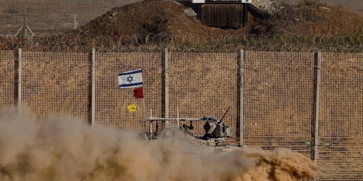 A military vehicle manoeuvres on Israeli side of the Israel-Gaza border, in Israel, October 3, 2025.
Amir Cohen/Reuters