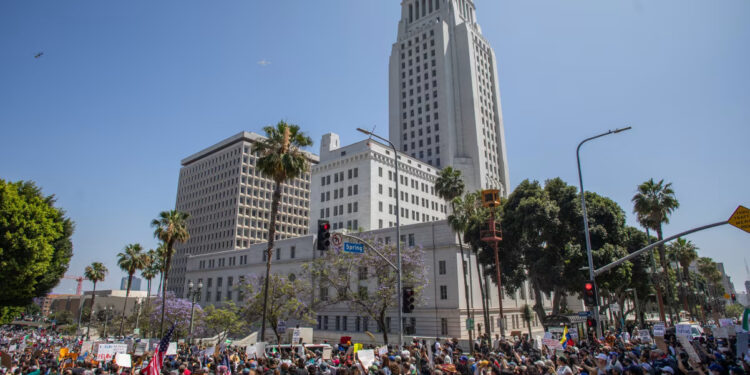 Protestors against immigration raids gather in front of the Los Angeles City Hall on June 8 in Los Angeles, California. Apu Gomes/Getty Images)