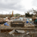 Community members sift through storm-tossed debris in Black River, Jamaica, days after Hurricane Melissa swept the coast. Photo Credit - Matias Delacroix