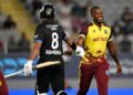 New Zealand’s Rachin Ravindra (L) gestures to West Indies bowler Matthew Forde during the T20 match in Auckland, New Zealand, on November 5. - AP Photo