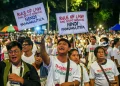 People taking part in a mass demonstration against government corruption at Rizal Park in Metro Manila, Philippines, on Sunday.Daniel Ceng / Anadolu via Getty Images