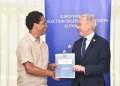 EU Rep handing over Mission's Report on the 2025 General and Regional Elections to APNU Lead Parliamentarian Dr. Terrence Campbell