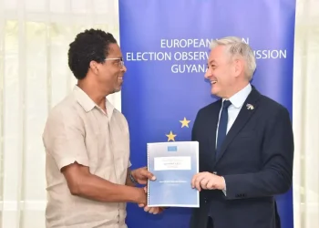 EU Rep handing over Mission's Report on the 2025 General and Regional Elections to APNU Lead Parliamentarian Dr. Terrence Campbell