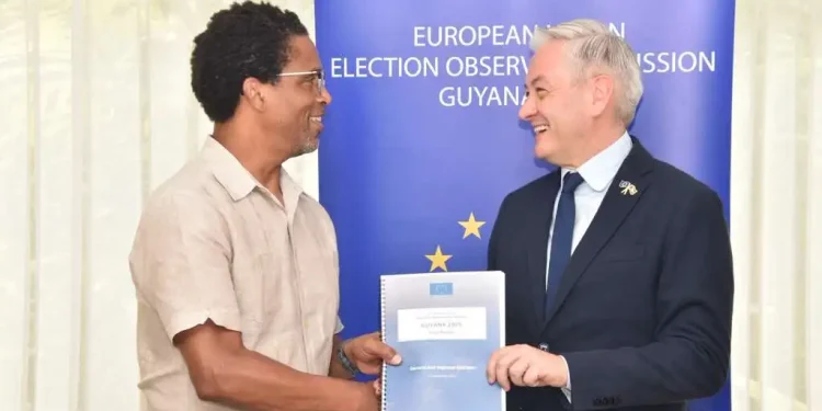 EU Rep handing over Mission's Report on the 2025 General and Regional Elections to APNU Lead Parliamentarian Dr. Terrence Campbell