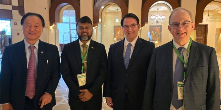Pt. Ubraj Narine (2nd left) flanked by other participants at the Conference.