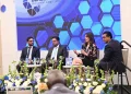 Minister of Public Service, Government Efficiency and Implementation, Zulfikar Ally (Far left), listens to a panellist