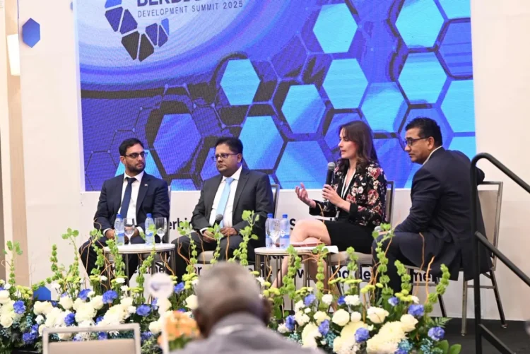 Minister of Public Service, Government Efficiency and Implementation, Zulfikar Ally (Far left), listens to a panellist