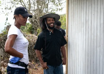 BossMom's Michelle Gordon and Ziggy Marley on site at a house build recently in association with Food for the Poor.