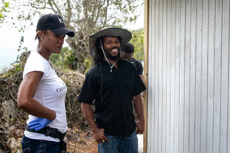 BossMom's Michelle Gordon and Ziggy Marley on site at a house build recently in association with Food for the Poor.
